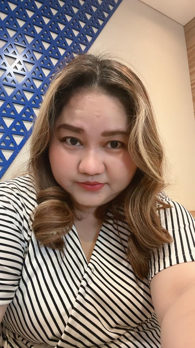 loan adviser Wita Anggraeni