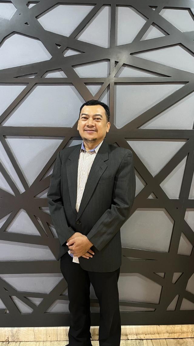 loan adviser Lukman Hakim